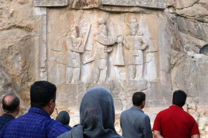 طاق بستان x